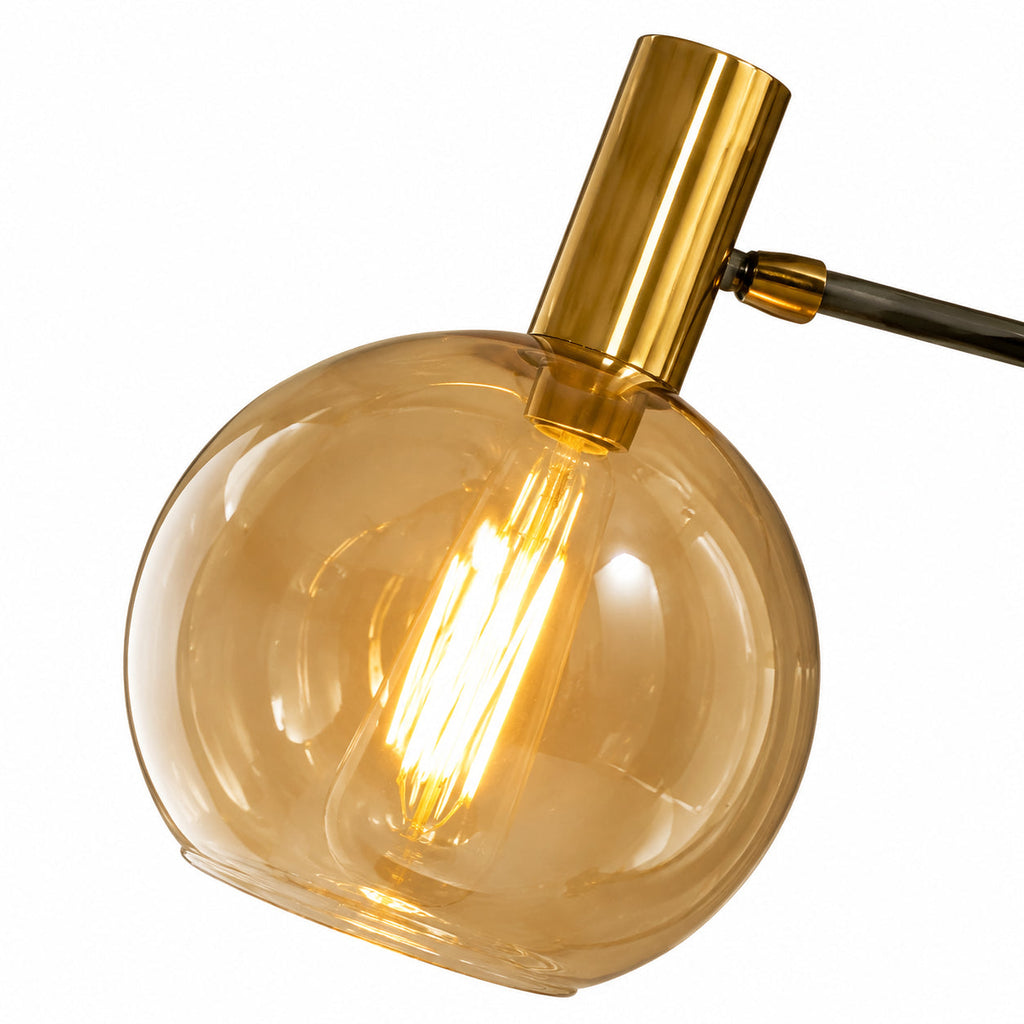 Amber Glass Globe Floor Lamp — amber globe and slim floor-lamp stem