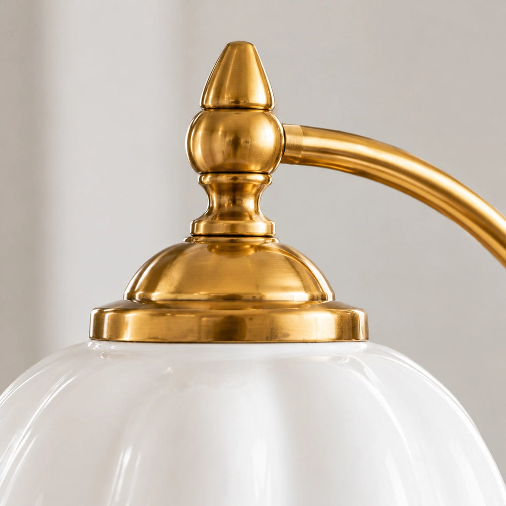 Ceramic Flower Shade Table Lamp — scalloped white shade and curved brass-colour stem