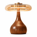 Amber Glass Mushroom Table Lamp with Wood Base — amber glass dome and curved wood-grain base